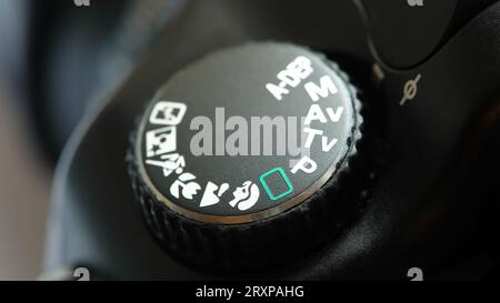 Canon professional DSLR camera settings dial macro, detail extreme closeup, shallow dof Different photo camera modes, learning digital photography abs Stock Photo