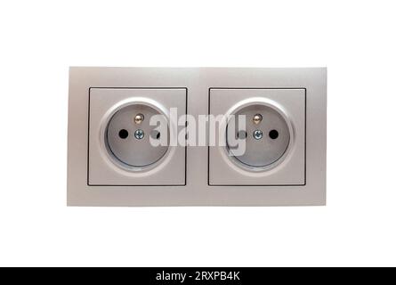 Double electric socket in a wall, two simple silver EU European wall sockets with projecting earth pin front view, frontal shot, object isolated on wh Stock Photo