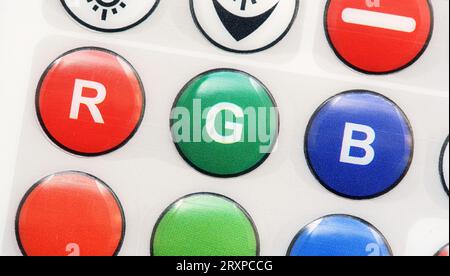 RGB Red Green blue buttons LED smart light remote control object detail, extreme closeup. Primary colors, basic colors lighting simple abstract concep Stock Photo