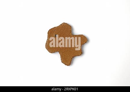 Piece of beige nubuck suede isolated on a white background. Symbolic designation of a product made of genuine leather Stock Photo