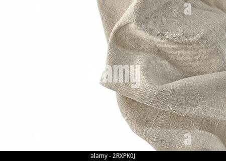 Beige rough linen kitchen towel tablecloth isolated on white background Stock Photo