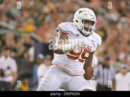 Texas defensive lineman Alfred Collins (95) celebrates after a ...