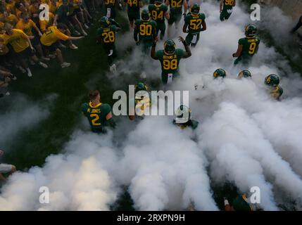 uSeptember 23 2023: Baylor Bears players run on the field before during the NCAA Football game between the Texas Longhorns and Baylor Bears at McLane Stadium in Waco, Texas. Matthew Lynch/CSM Stock Photo