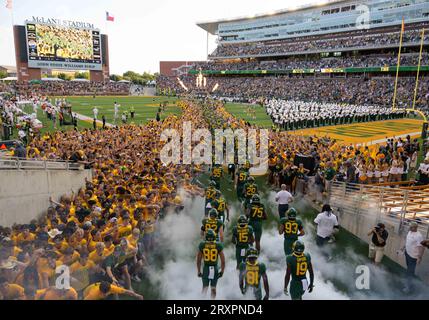 uSeptember 23 2023: Baylor Bears players run on the field before during the NCAA Football game between the Texas Longhorns and Baylor Bears at McLane Stadium in Waco, Texas. Matthew Lynch/CSM Stock Photo