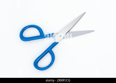 Blue scissors isolated on the white background. Stock Photo