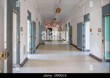 Patient hallway in the abandoned Trans Allegheny Lunatic Asylum, in Weston, West Virginia Stock Photo