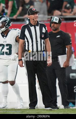 Down judge David Oliver (24) watches a replay on the video board during an  NFL football game between the Philadelphia Eagles and the Tampa Bay  Buccaneers, Monday, Sept. 25, 2023, in Tampa,