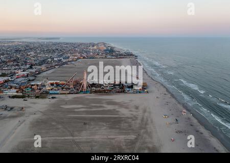 Amusement park by the Boardwalk in Wildwood, New Jersey at sunset. Stock Photo