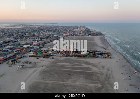 Amusement park by the Boardwalk in Wildwood, New Jersey at sunset. Stock Photo