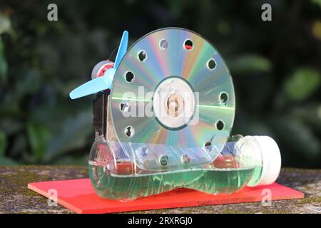 Bubble blower device on outdoors. Machine that makes bubbles using dish washing liquid kept on outdoor Stock Photo