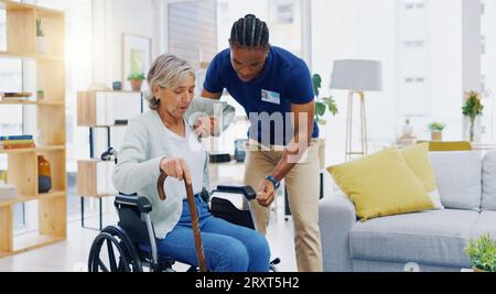 Help, home care and a woman with a caregiver and a wheelchair for disability, support and consulting. Happy, talking and a black man or male nurse Stock Photo