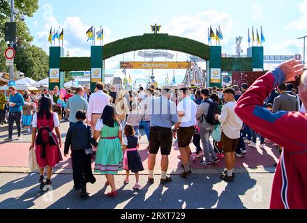 People at the entrance at Beer festival Oktoberfest, Wiesn on Sept 24, 2023 in Munich, Germany. Stock Photo