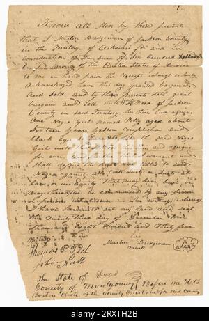 Slave Bill of Sale. Hand-written, two-sided document transferring ownership of sixteen-year old slave girl named Polly with 'yellow complexion and black eyes' for $600. Executed by Martin Bridgeman of Jackson County, Arkansas. Stock Photo