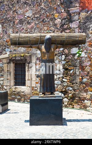 Religious Statue of penitent, Ex-Convent of San Bernardino de Siena, Taxco, Guerrero, Mexico, North America Stock Photo