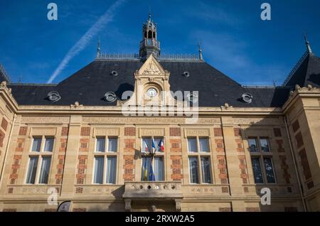Looking up at the front of the Mairie de Montrouge, or Montrouge Town Hall,  in Montrouge,  a suburb just south of Paris, France. Stock Photo