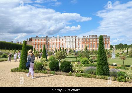 Hampton Court Palace and Privy Garden in summer.  The historic royal palace borders the London Borough of Richmond upon Thames and Surrey, England, UK Stock Photo