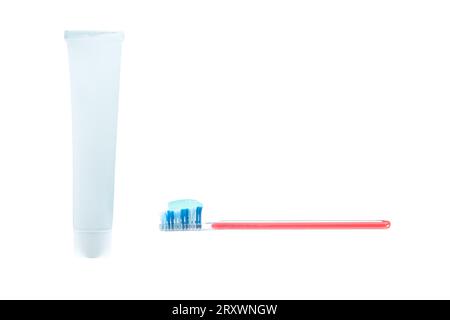 toothbrush and tube of toothpaste isolated on white background Stock Photo
