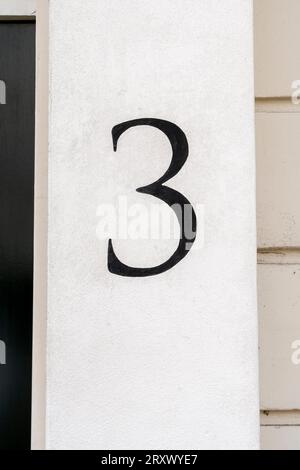 Black figure number three on white background Stock Photo