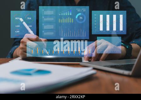 business analysis and Data Management System financial KPI data profits dashboard on virtual screen. working with big data finance management technolo Stock Photo