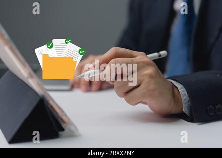 data subject rights management system. business man holding folder and document icon software. Cloud Network technology concept Stock Photo