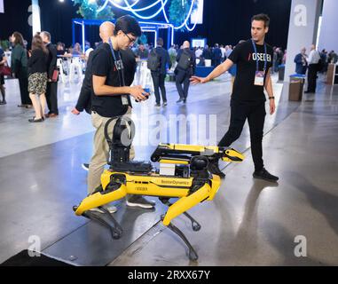 Technicians walk a robot dog at the All In artificial intelligence conference Wednesday, September 27, 2023  in Montreal.THE CANADIAN PRESS/Ryan Remiorz Stock Photo