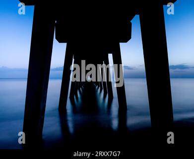 Underneath the Fishing Fishing Pier on the Gulf of Mexico in Venice Florida USA Stock Photo