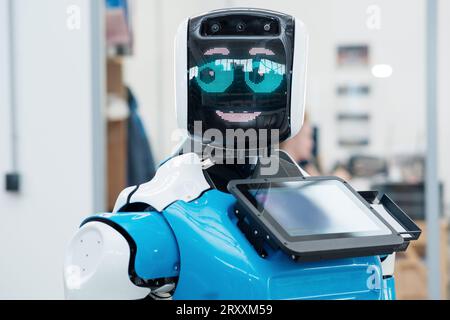 Perm, Russia - July 13, 2023: friendly humanoid robot guide expressing ...