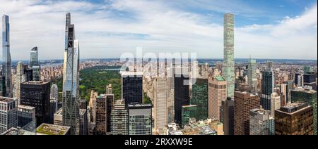 MIDTOWN MANHATTAN, NEW YORK, USA, - SEPTEMBER 15, 2023.  An aerial panoramic view of the buildings and skyscrapers surrounding Central Park in Midtown Stock Photo