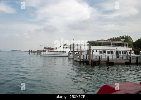Venice, Italy, September 2023, water busses on the waters approaching Venice Stock Photo