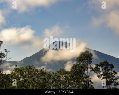 View of some scattered clouds floating in the morning near the Iguaque mountain, in the eastern Andean mountains of central Colombia. Stock Photo