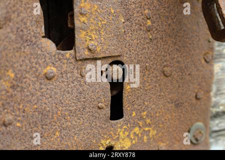 Close up on a very rusty old lock Stock Photo