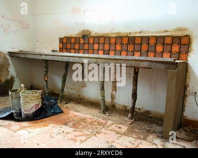 View of the quite improvised and obsolete construction of a kitchen countertop in a rural house, in the eastern Andean mountains of central Colombia. Stock Photo