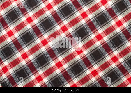 Red, white and gray plaid fabric in a close up view Stock Photo