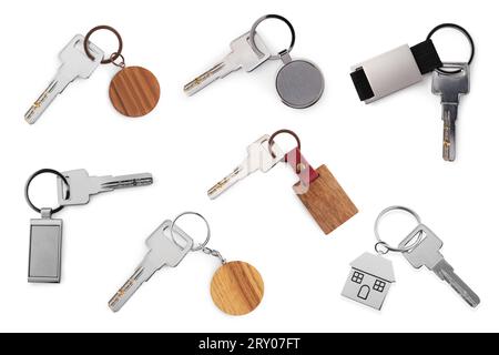 Set of keys with key chains isolated on white Stock Photo