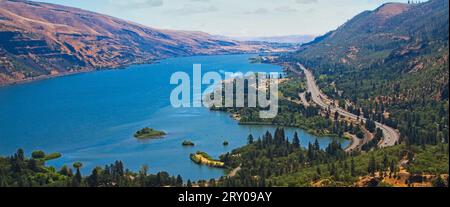 The Columbia river with interstate 84 winding along side it seen from Rowenas Crest in Oregon. Stock Photo