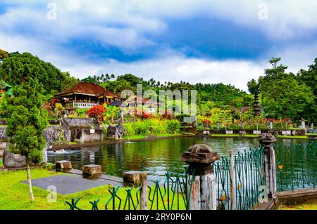 Pergolas, pond and fountain in the water palace Tirta Gangga. Bali. Indonesia Stock Photo