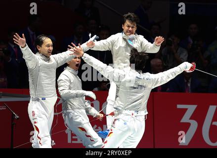 (230928) -- HANGZHOU, Sept. 28, 2023 (Xinhua) -- Team China celebrate after the Men's Sabre Team Semifinal of Fencing at the 19th Asian Games in Hangzhou, east China's Zhejiang Province, Sept. 28, 2023. (Xinhua/Yang Lei) Stock Photo