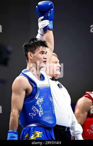 (230928) -- HANGZHOU, Sept. 28, 2023 (Xinhua) -- He Feng (L) of China wins the Men's 70kg Final of Wushu at the 19th Asian Games in Hangzhou, east China's Zhejiang Province, Sept. 28, 2023. (Xinhua/Jiang Han) Stock Photo