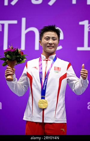 (230928) -- HANGZHOU, Sept. 28, 2023 (Xinhua) -- Li Yueyao of China attends the awarding ceremony for the Women's 52kg of Wushu at the 19th Asian Games in Hangzhou, east China's Zhejiang Province, Sept. 28, 2023. (Xinhua/Jiang Han) Stock Photo