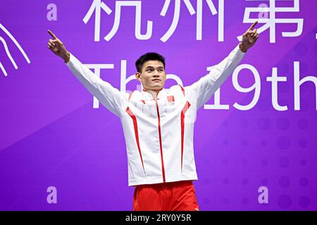 (230928) -- HANGZHOU, Sept. 28, 2023 (Xinhua) -- He Feng of China attends the awarding ceremony for the Men's 70kg of Wushu at the 19th Asian Games in Hangzhou, east China's Zhejiang Province, Sept. 28, 2023. (Xinhua/Jiang Han) Stock Photo