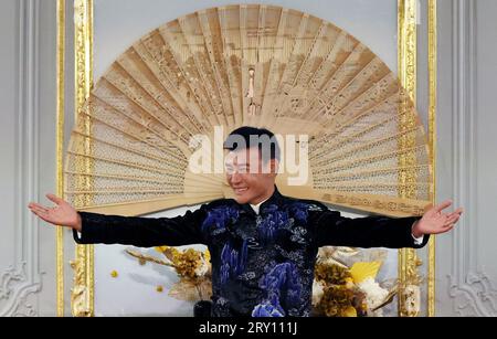 (230928) -- PARIS, Sept. 28, 2023 (Xinhua) -- Designer Laurence Xu appears at the end of the Prince Kung's Palace Fashion Show at Chinese culture center in Paris, France, Sept. 27, 2023. (Xinhua/Gao Jing) Stock Photo