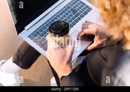 unrecognizable man working with a laptop Stock Photo