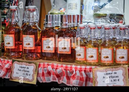 Strasbourg, France - May 31, 2023: Traditional artisanal gingerbread liquor from Fortwenger brand on display at a store in old town on Grande Ile Stock Photo