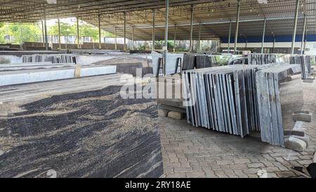 granite stone slabs of himalayan blue pattern for flooring arranged in layers of stacks the factory storage outlet Stock Photo