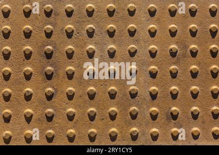 Close-up of manhole cover of steel with rust as background. High quality photo Stock Photo