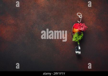 Molecular modern cuisine galantine duck in spoons on rusty background. Top view. Stock Photo