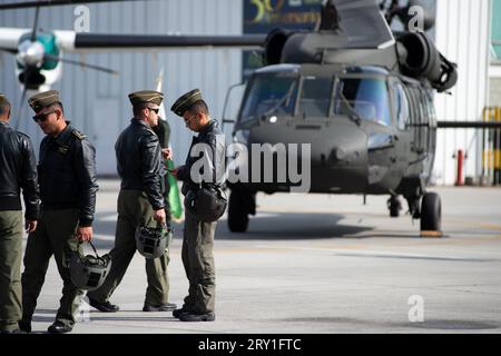 Colombian narcotics police pilots during an event at the CATAM - Airbase in Bogota, where the United States of America embassy in Colombia gave 3 Lock Stock Photo