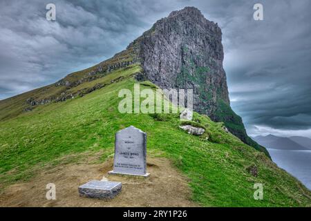 Kallur Lighthouse and James Bond memorial stone on Kalsoy, Faroe Islands Stock Photo