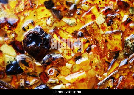 closeup baltic amber stones rectangular lie on a flat surface. Stock Photo