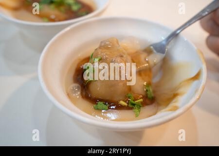 Taiwanese meatball - Delicious street food Bawan (Ba wan), steamed and deep fried starch wrapped round shaped dumpling with pork inside Stock Photo